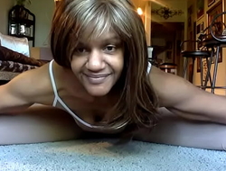 Ginger MoistHer Sexy Stretches in Tan bodysuit.  Legs wide open.  Enjoy the stretch.  Subscribe!  Lay Down Comedy!