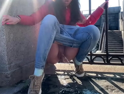 Girl pee in a public place